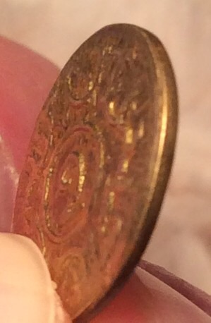 Small-Gold-Colored-Coin-With-A-2-On-It?-No-Clue-What-It-Is.